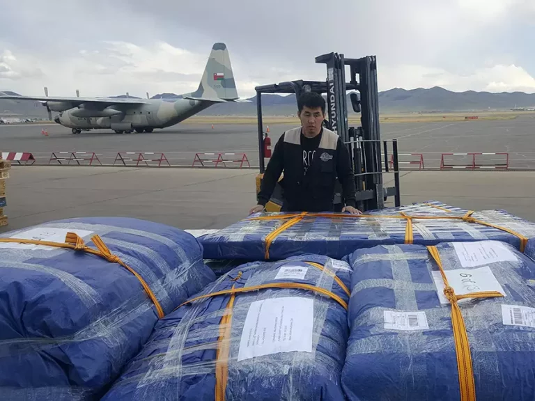 Yurt parts at the airport ready for shipment on a plane